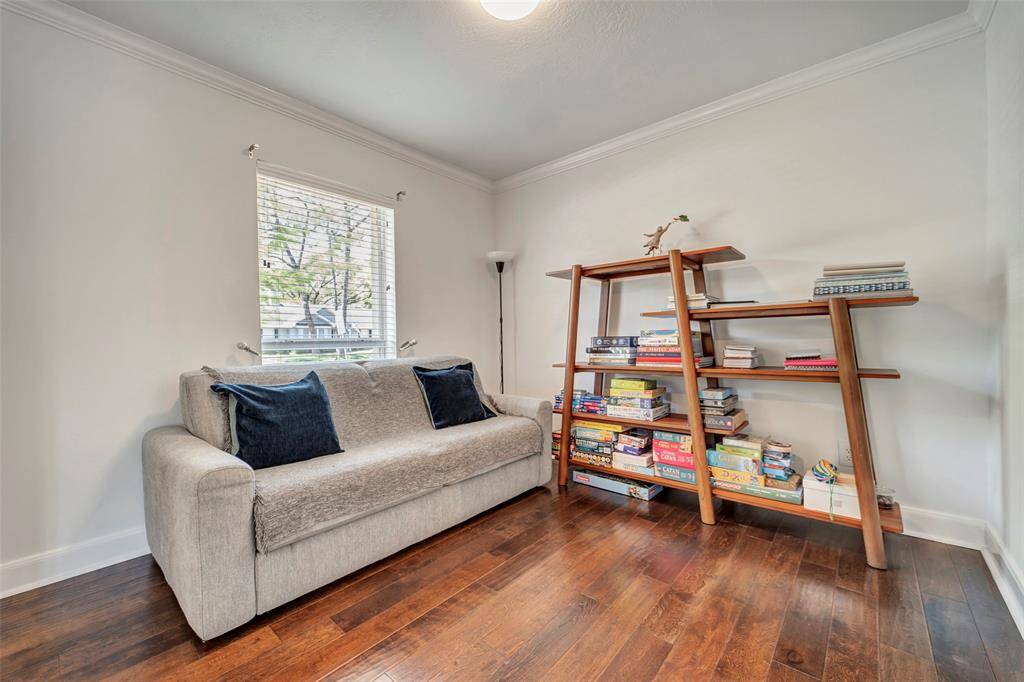 The flex space is currently being used as a second family room. It could even be used as a study or formal living area! This room is situated between the formal dining room and the kitchen.