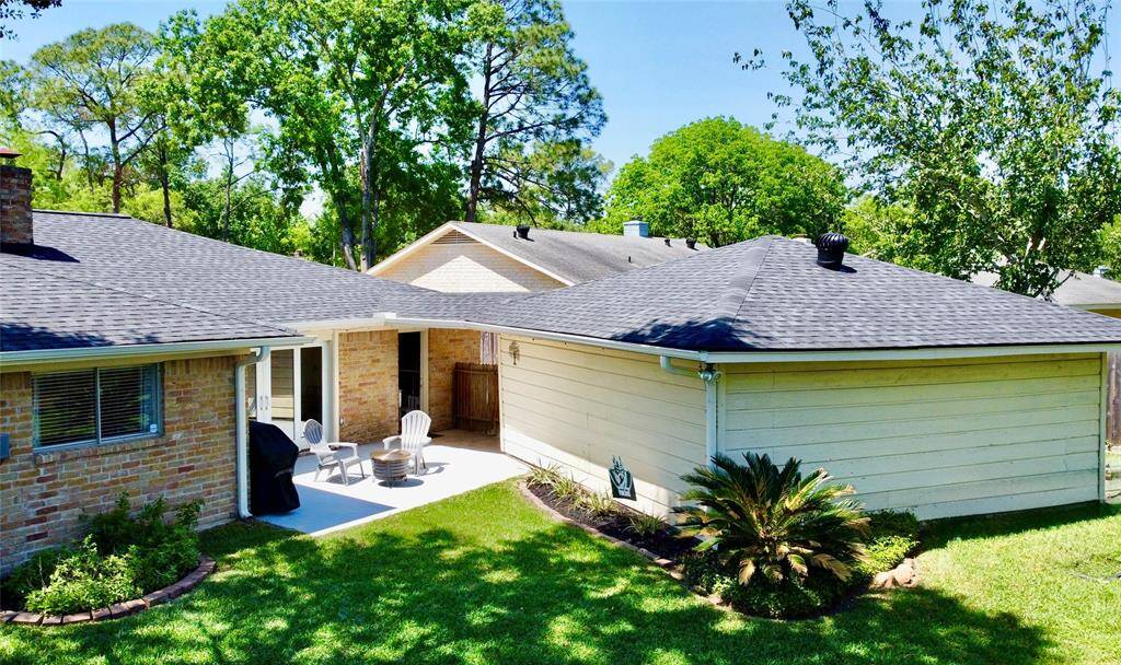 An overhead view of the home and backyard.