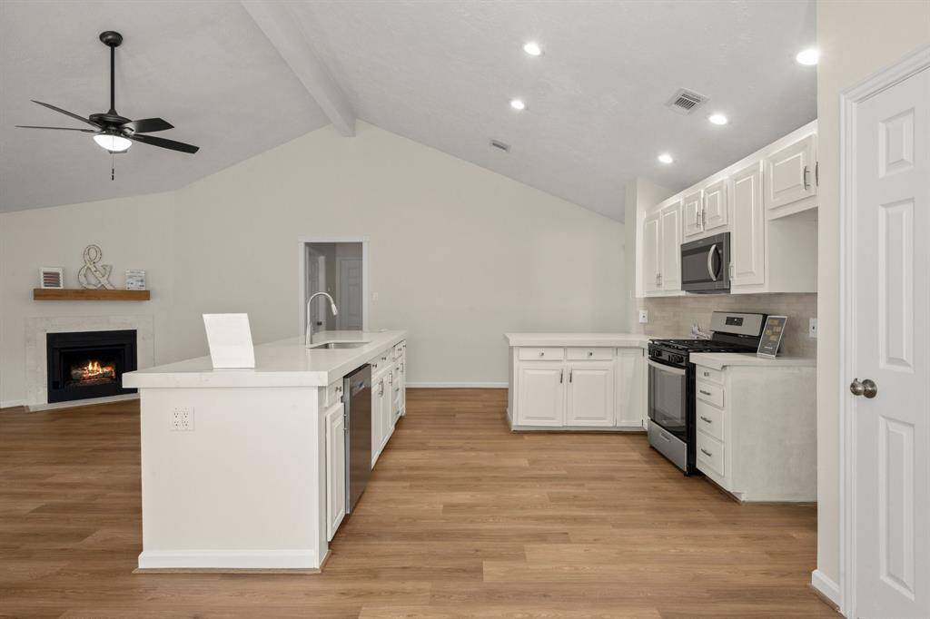 including a 30-inch gas range and dishwasher.