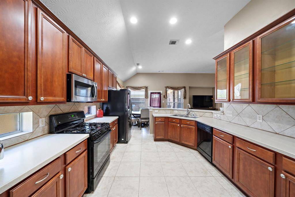 Spacious, open-concept kitchen with fantastic storage. Perfectly positioned to stay connected while cooking and entertaining.