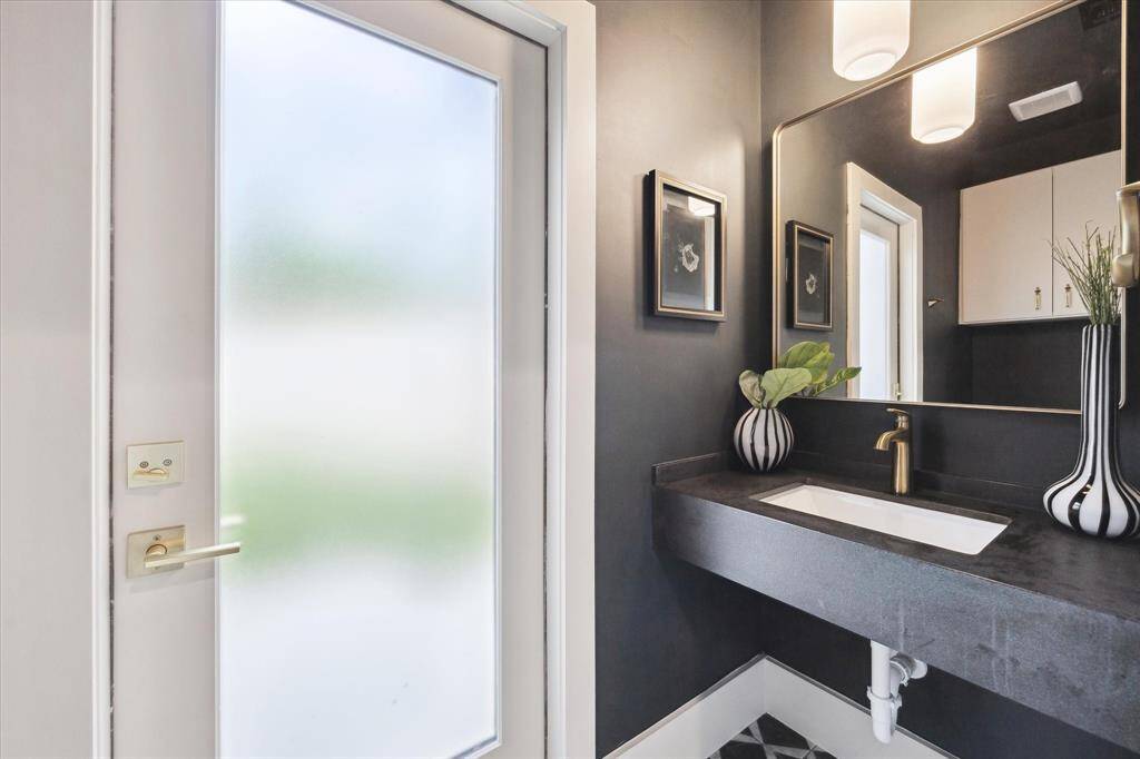 powder bath in the back of the house with outdoor access