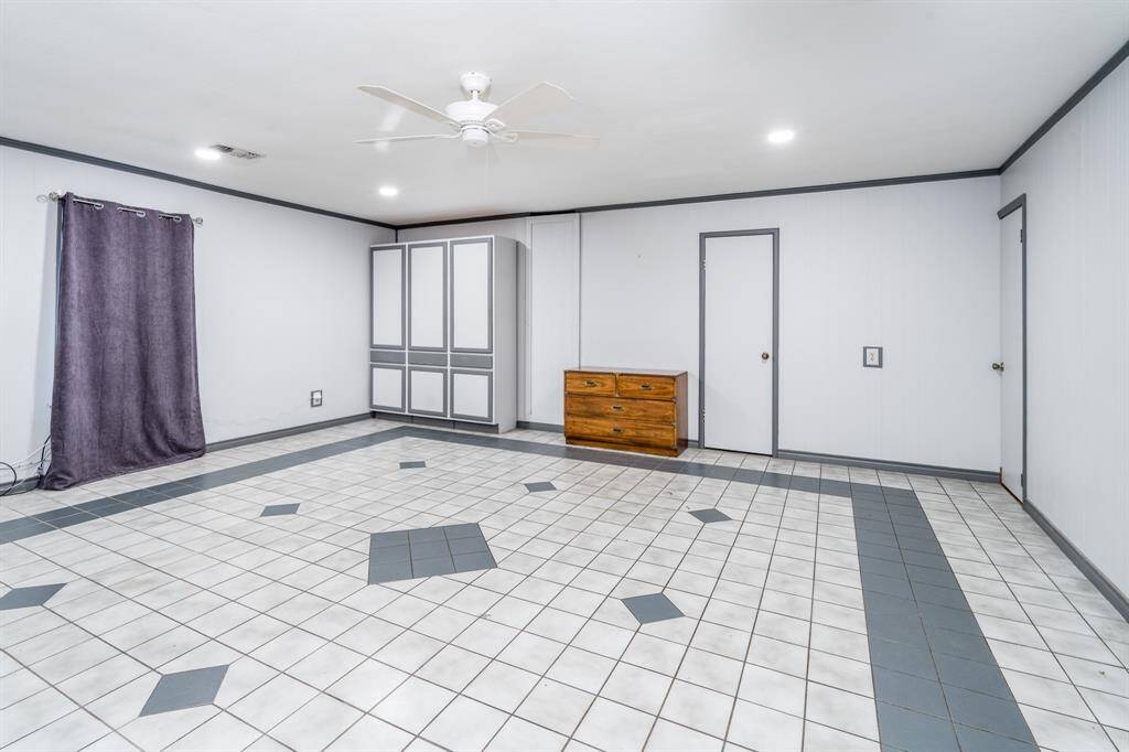 Large game room would also be the perfect large study if desired or 4th bedroom.  Virtually staged photo.
