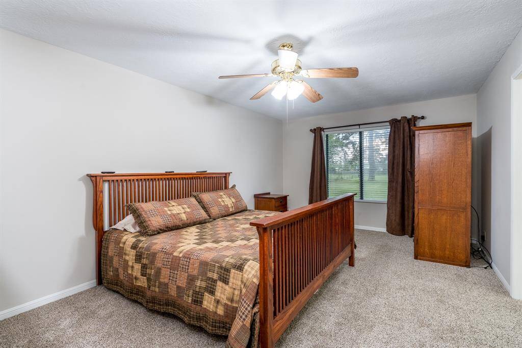 Large primary bedroom also with recent paint and carpet.