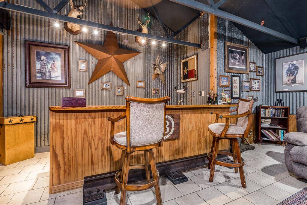 Built-in bar for serving your favorite cocktails in your party pool house.