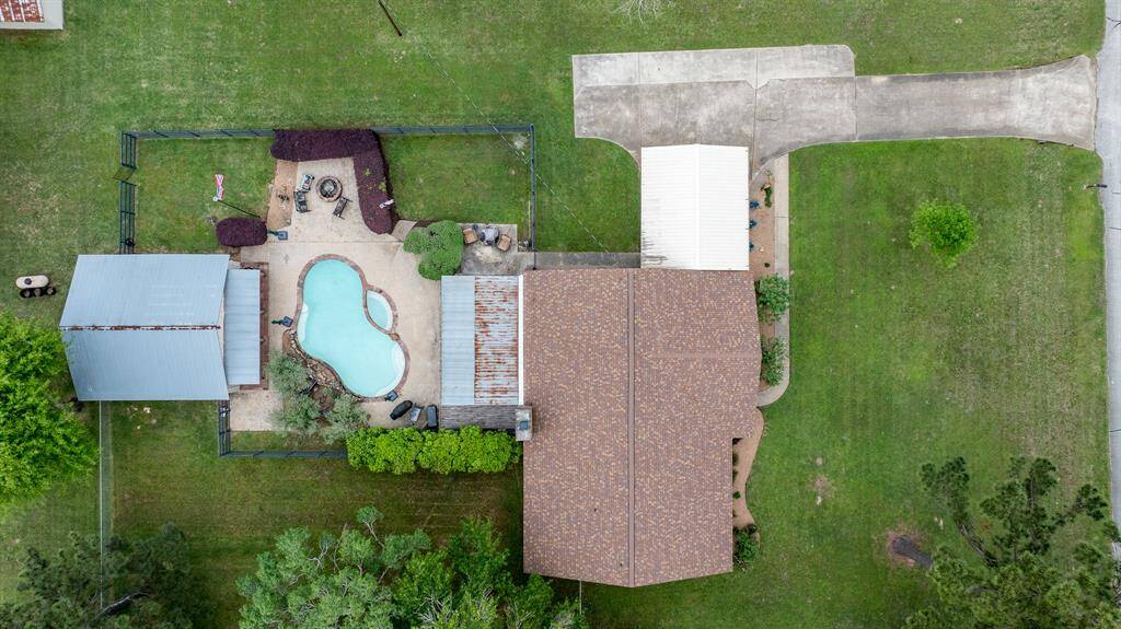 The pool area is fully fenced and you have even more yard outside of that area for pets, horses, chickens...