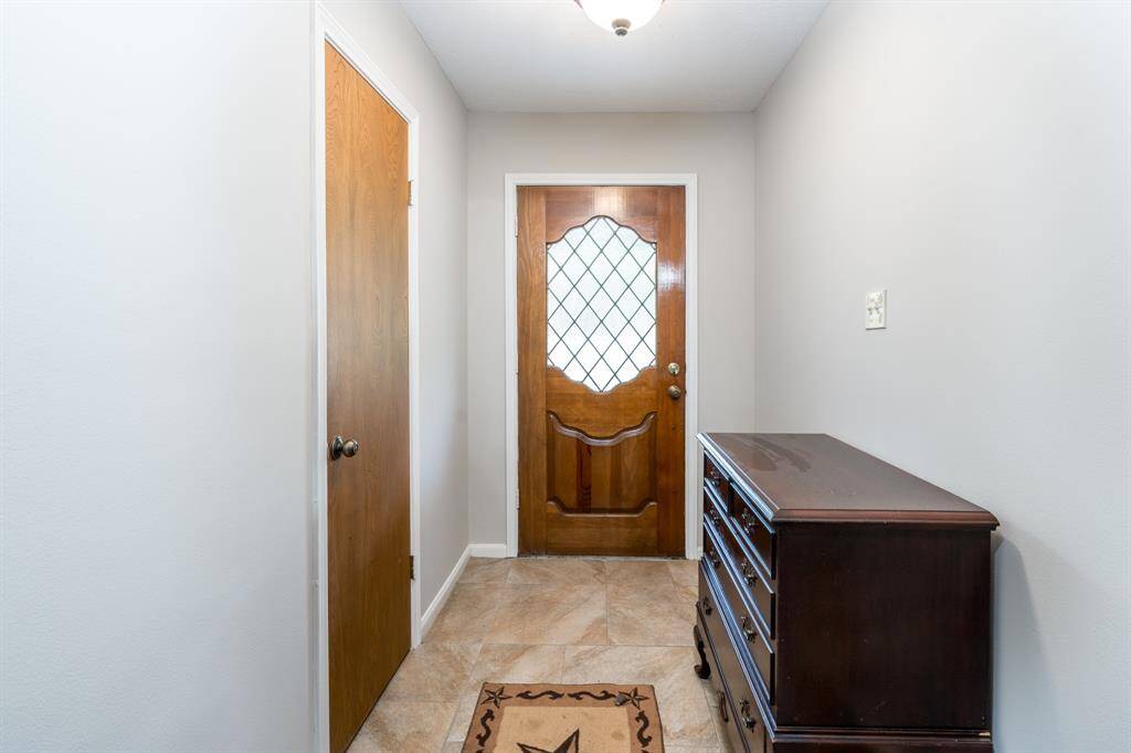 Welcome home! Multi-sized tile here and throughout much of the home.