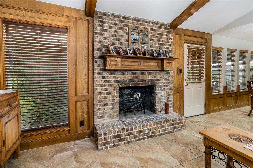 The living is anchored by this cozy real fireplace.