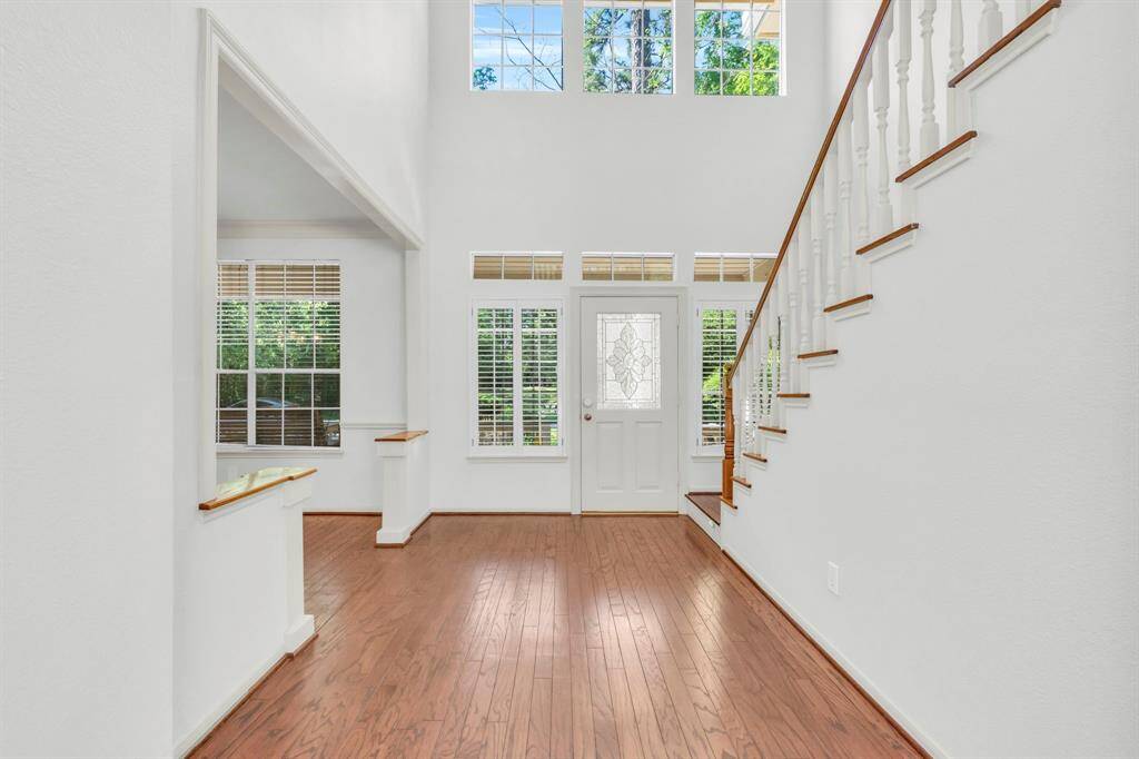 Looking back towards front entry. House interior freshly painted 2025