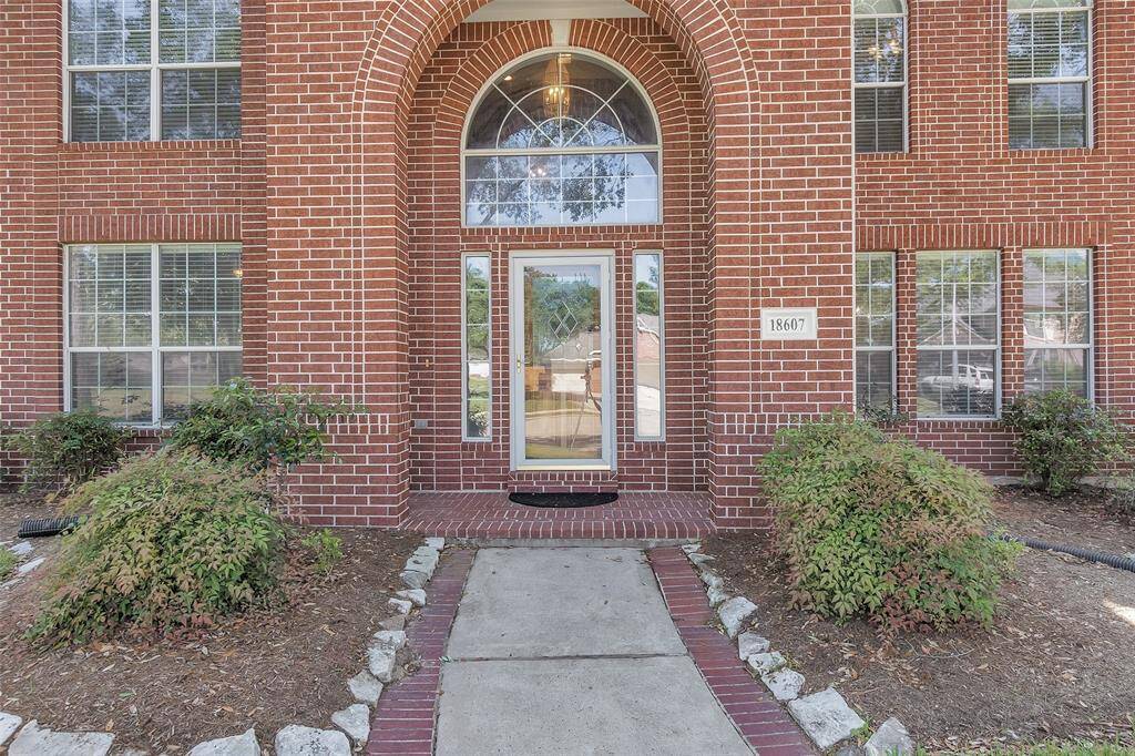 Welcome to your new home! This stunning entrance features elegant brickwork and large windows, inviting natural light while offering a warm, welcoming ambiance. A perfect blend of style and comfort awaits.
