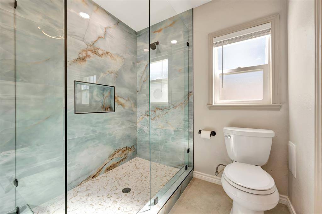 Primary Bathroom Beautifully Tiled