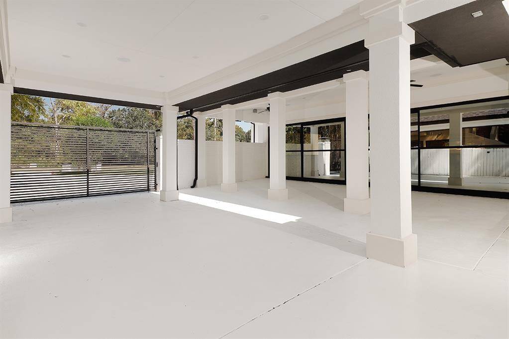 The gated porte-cochere opens to the catering kitchen, so staff can enter without disturbing guests.
