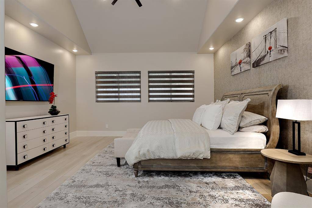 This bedroom is located in the west wing of the home, and is appointed with luxurious furnishings.  Both bedrooms in the west wing have their own beautiful bathrooms and walk-in closets.