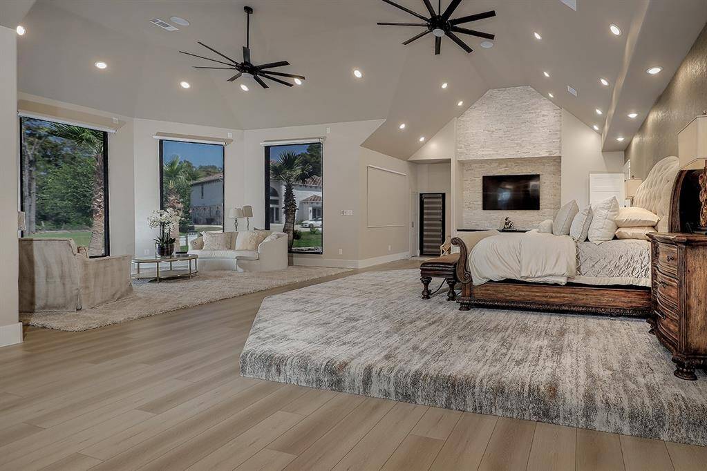 Another view of this impressive owner's retreat, adorned with vaulted ceilings.