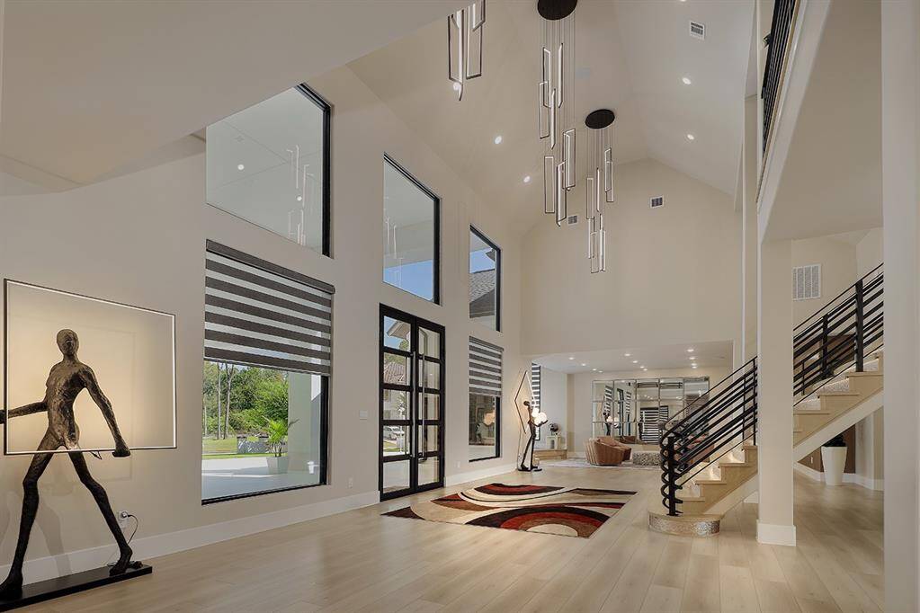 This home was taken down to the studs, and has 5/8 firewall drywall, a reverse osmosis system, whole house water softener, two tankless water heaters, and all new windows throughout.