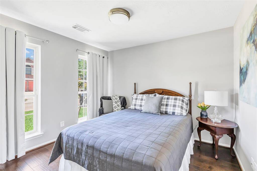 Another bedroom with lots of light and closet space.