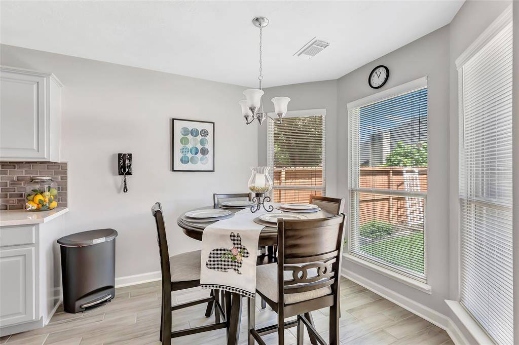 The breakfast room with a great view of the backyard.