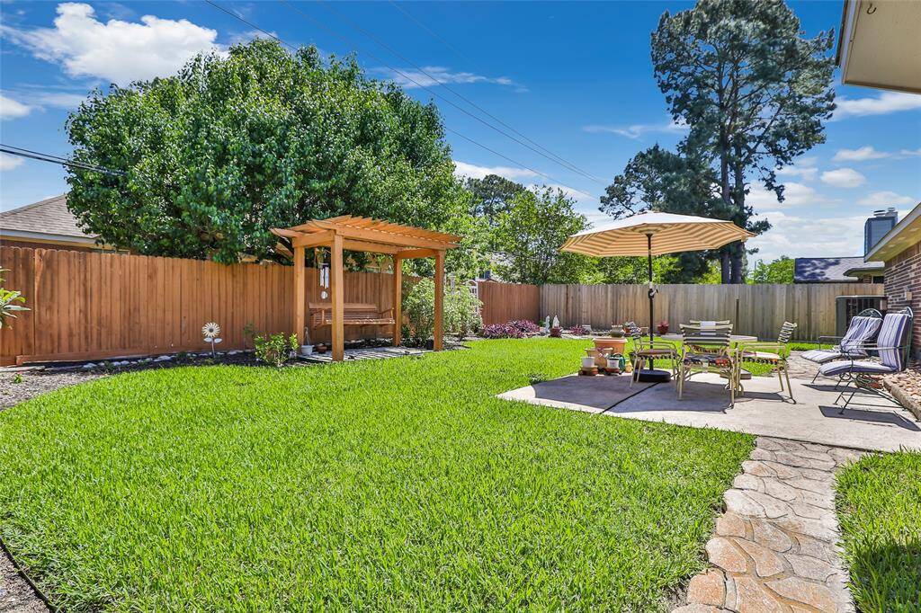 Lots of flower beds and a great patio!