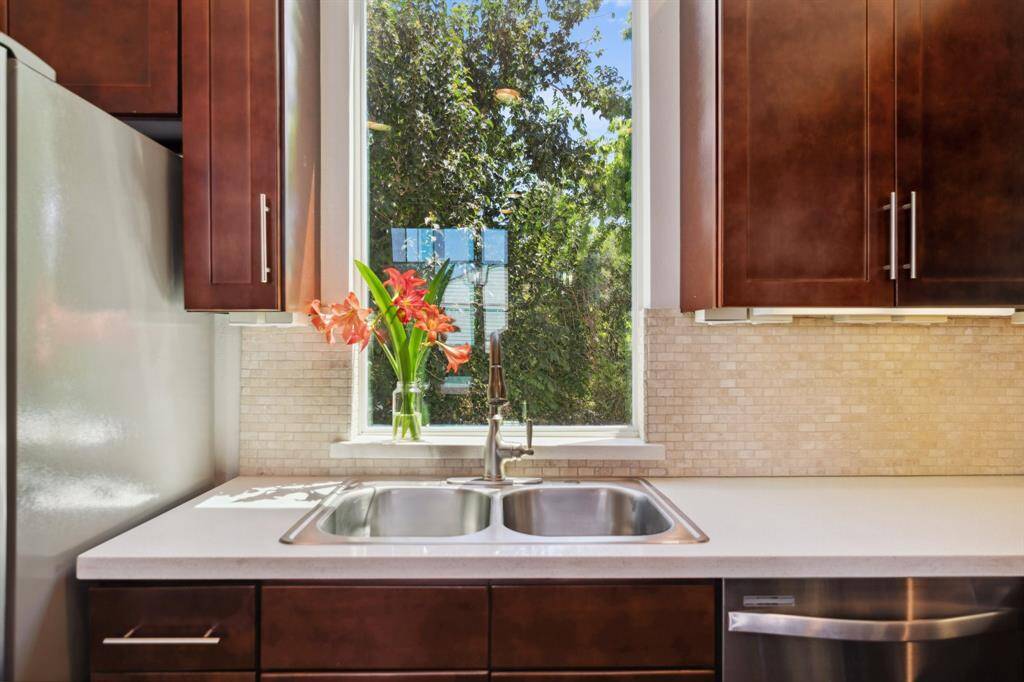 The kitchen features plenty of  countertop space.