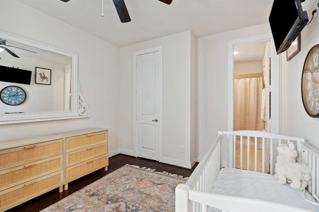 The laundry with shelves and pull down hanging space and shelves.