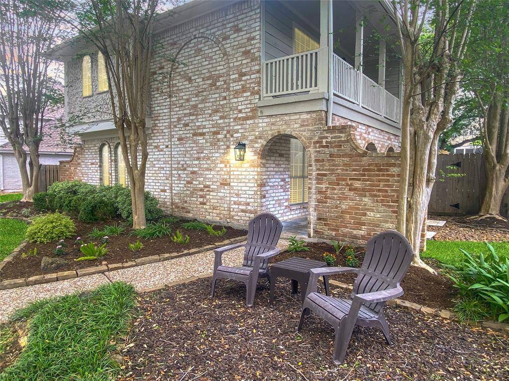 Impressive home in Ashford Village with beautiful landscaping nestled under mature trees on a highly desired, quiet cul-de-sac street.