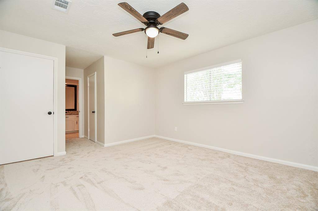 Bedroom #2 with walk-in-closet and direct access to the bathroom.