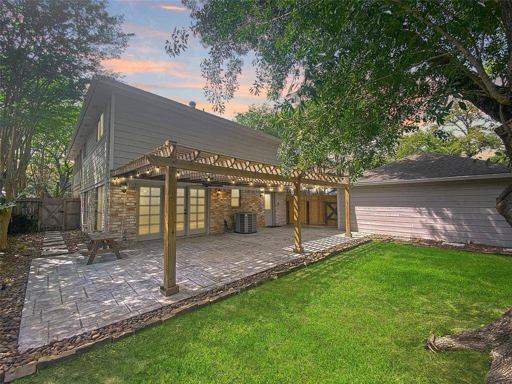 Enjoy entertaining in your beautifully shaded back yard with large patio and pergola.