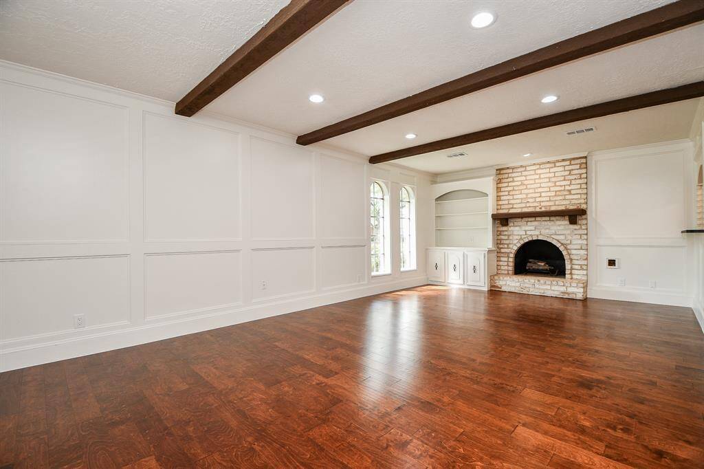 Gleaming laminate wood floors.