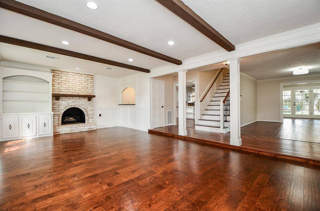 Wet bar conveniently located to the right of the fireplace.
