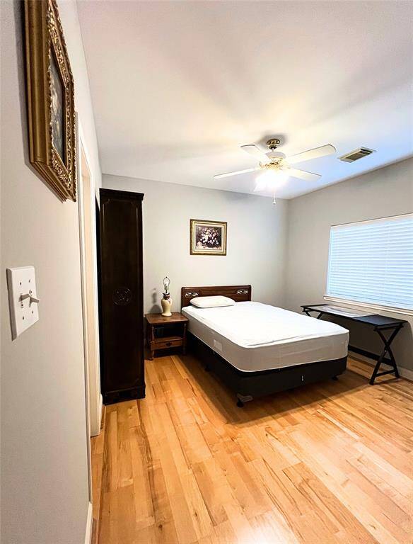 Jack and Jill bathroom includes an updated granite counter top, faucet, built-in medicine cabinet and generous storage space.