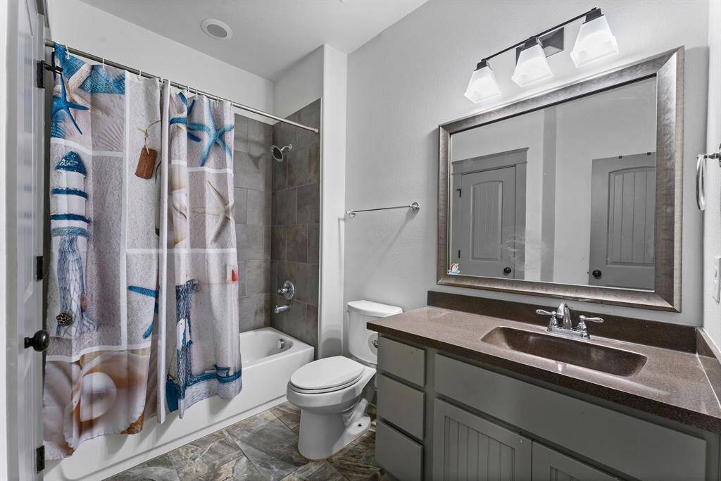 First floor full bathroom directly across bedroom