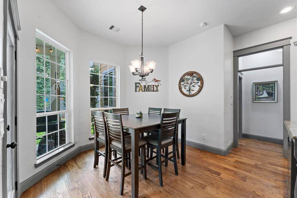 Breakfast area with primary bedroom off the kitchen