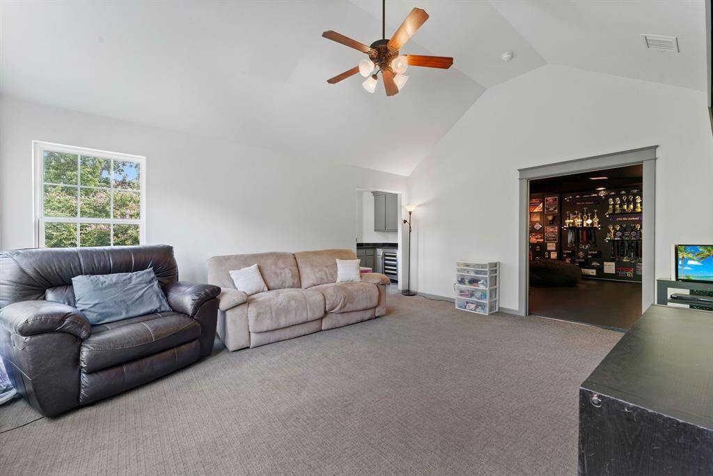 Another view of the game room. Wet bar behind.