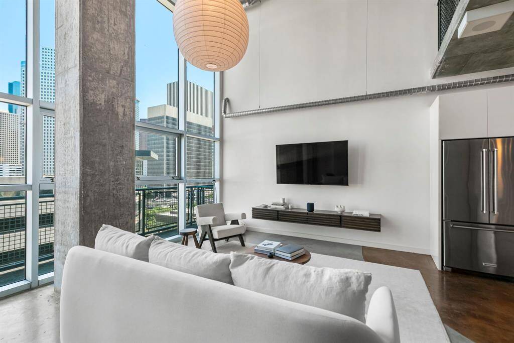 Living area. Built in floating entertainment center is included.