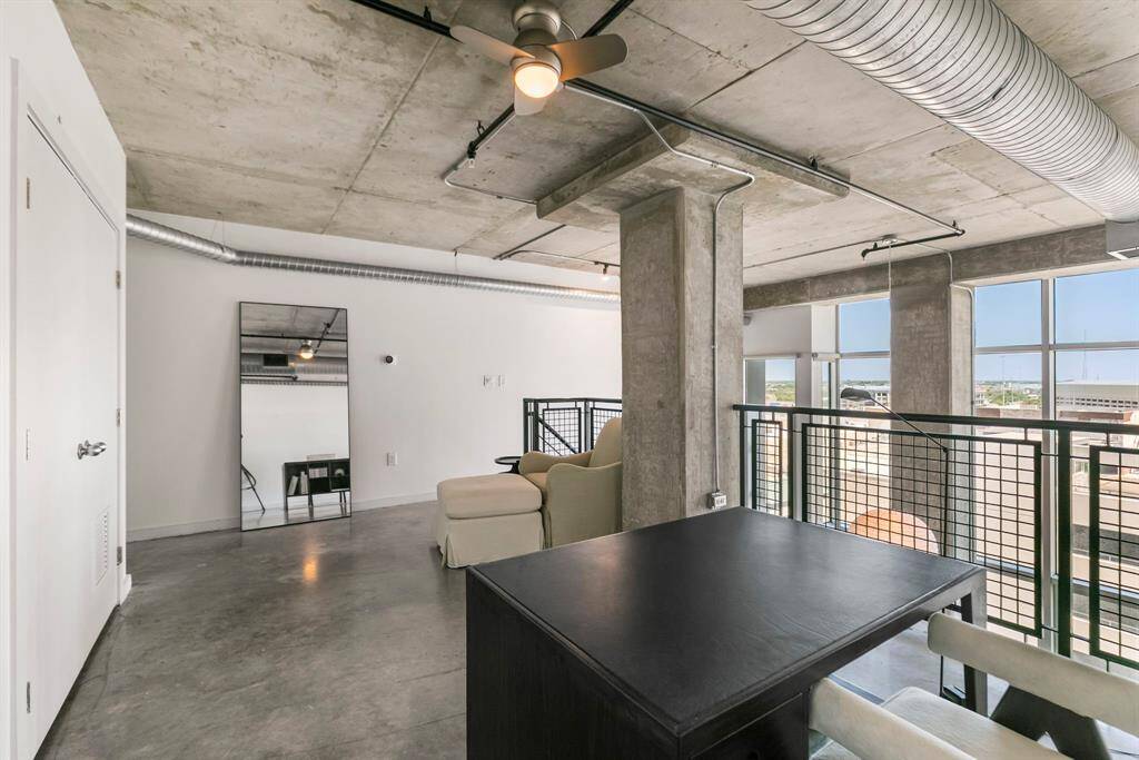 This loft area is perfect for a home office, gym, or another bedroom. Perfect flex space to use as needed!