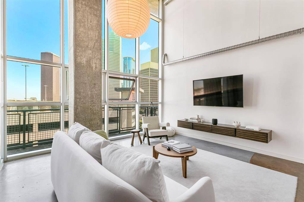 Wow, enjoy these stunning Downtown views from your living room. Windows open for fresh air.