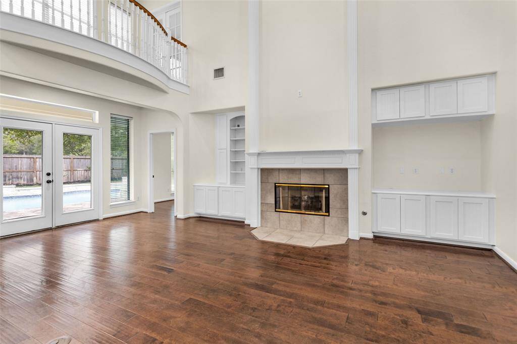 Living Area w/ Built in Cabinets