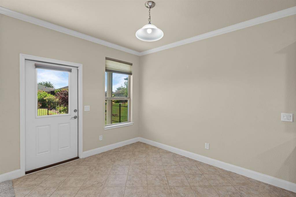 Step right out the backdoor and onto your covered patio—ideal for relaxing, dining, or enjoying a quiet moment outdoors!