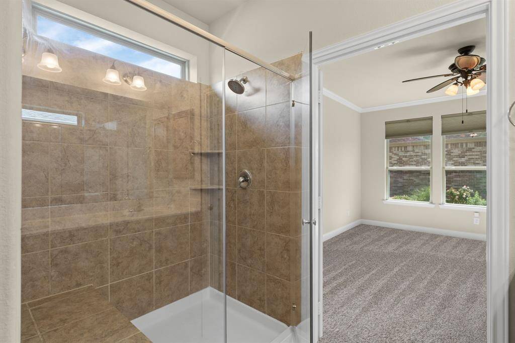 Spacious closet offers plenty of room for all your wardrobe essentials, keeping everything neatly organized and easily accessible.