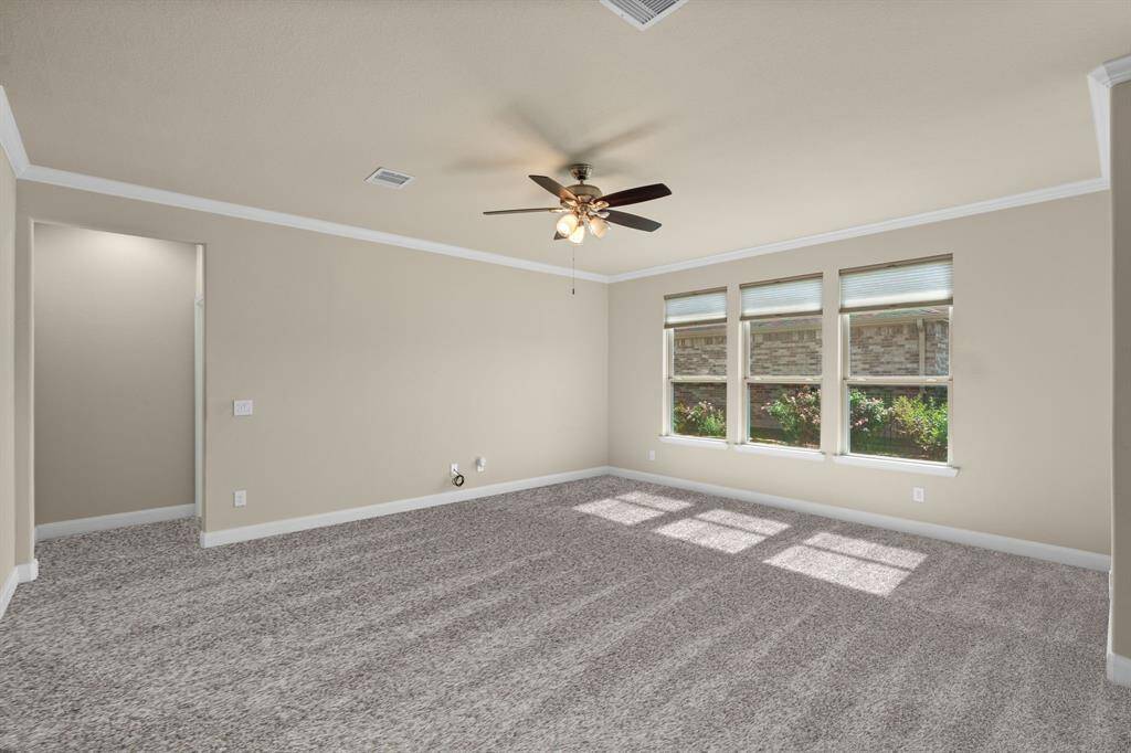 The Gathering Room is filled with natural light from three large windows, creating a bright and cheerful space. Brand new plush carpet will be installed on 5/2—just in time to make this room feel extra cozy!