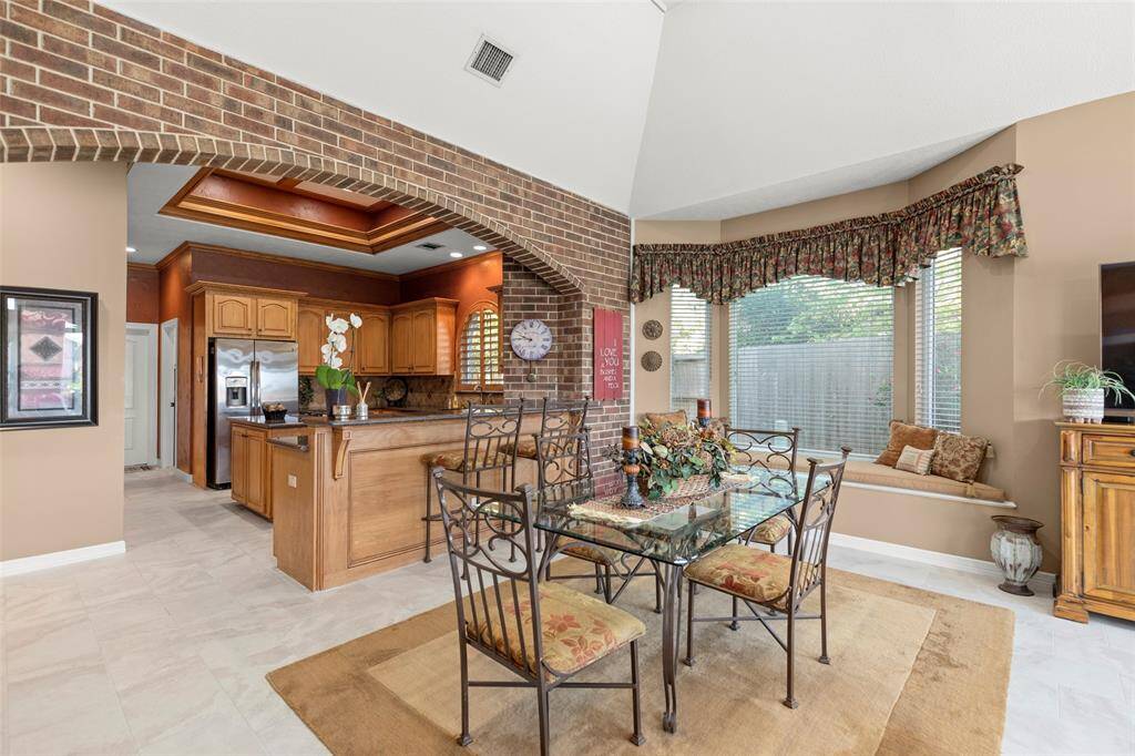 Serene Open Floor Plan and an Elegant Brick Archway and a Window Nook