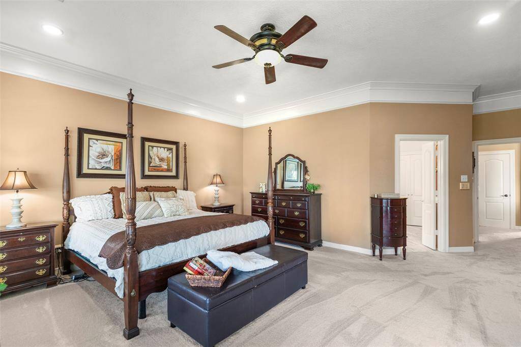 Spacious Primary Bedroom with Ample Natural Lighting and Air Flow