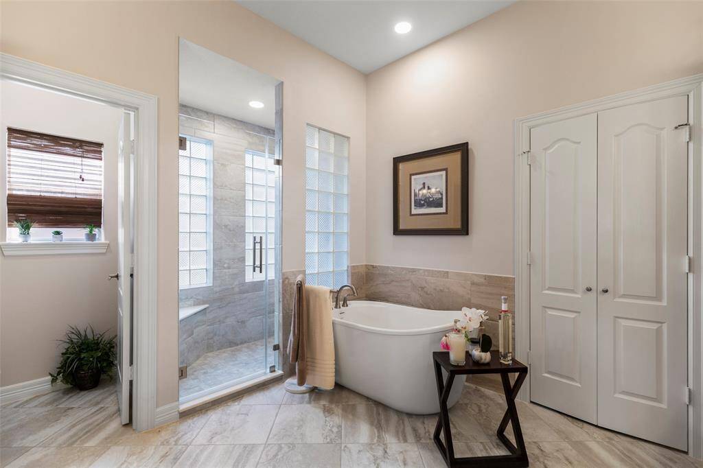 Lovely Primary Bath with Separate Tub and Shower and Private Toilet