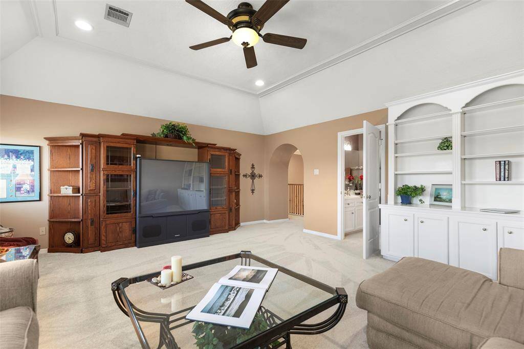 Huge Media Room for Endless Possibilities with Built-in Shelving and very Spacious
