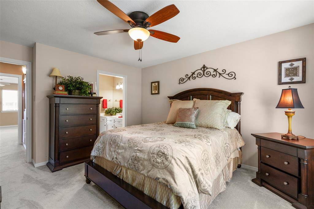 Bedroom with a Connected Bathroom, Natural Lighting and Ceiling Fan