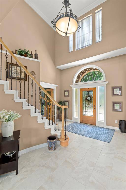 Spacious Area with Lovely Tile Flooring and Large Windows Providing Ample Amount of Natural Lighting