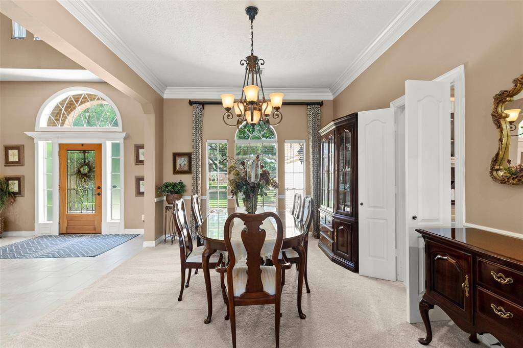 Open Dining Room with a Beautiful View and Natural Lighting.