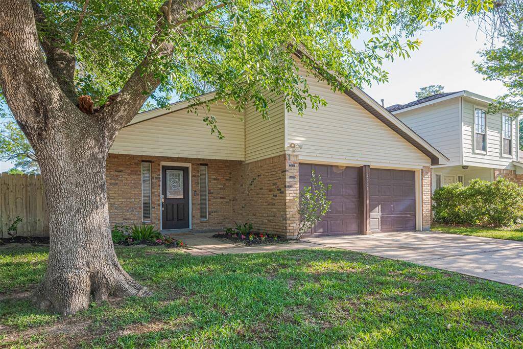 Welcome Home. Open Concept Living Area with fire place, tile flooring and tons of natural light.