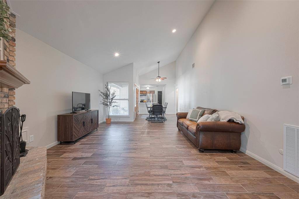 Living Room with updated tile throughout.