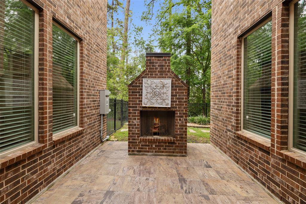 This private atrium area is off the living and completely secluded from neighbors!!! Enjoy a fire and a conversation...