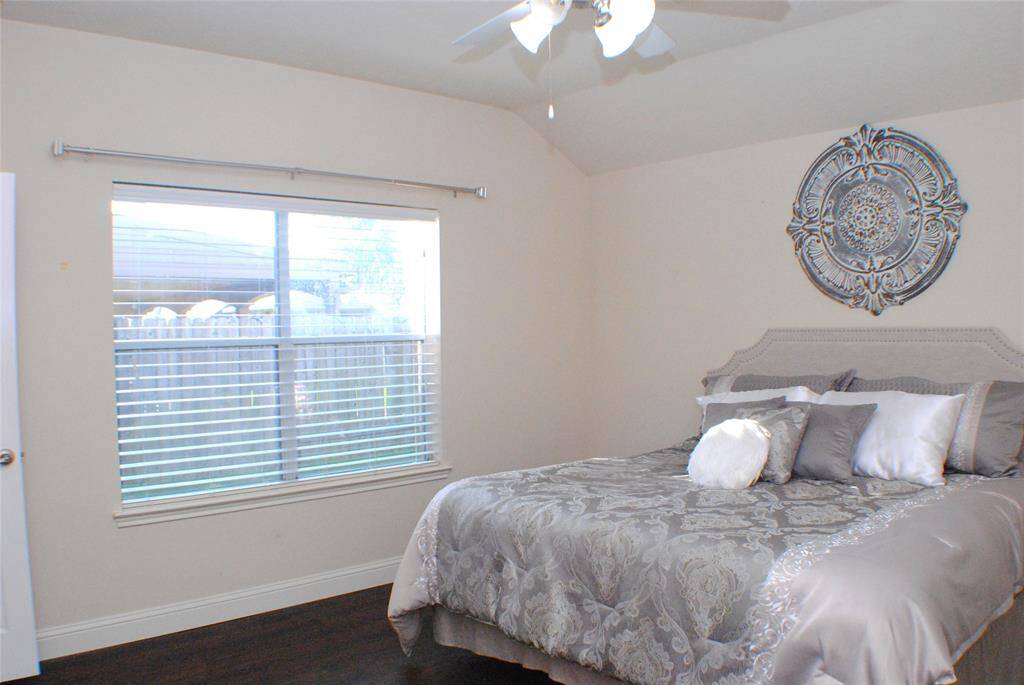 Another view of the primary bedroom, which has TWO separate walk in closets!